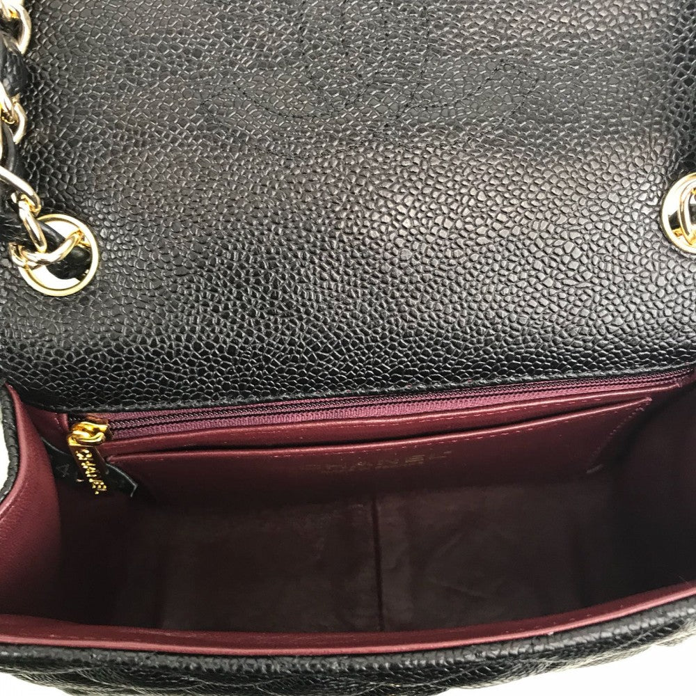 chanel-caviar-mini-flap-bag-1-55-black-gold4