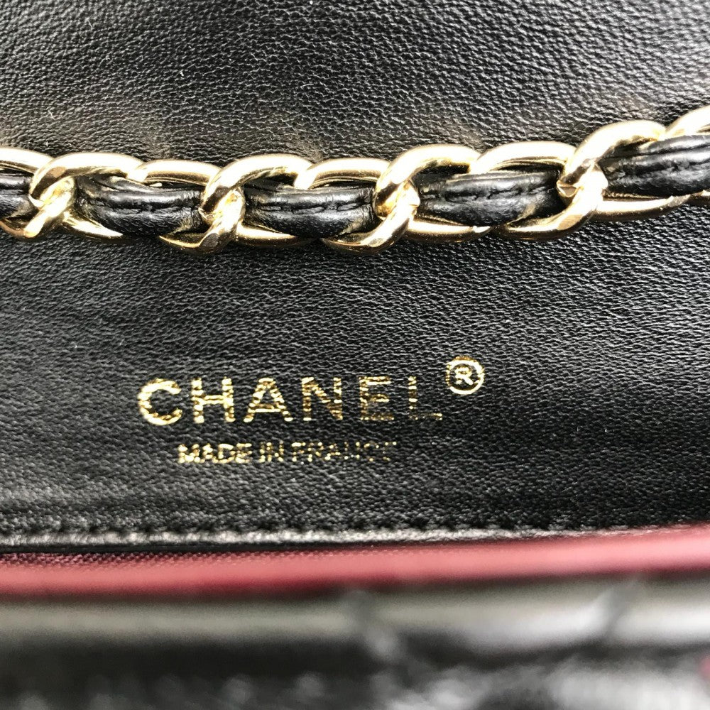 chanel-mini-chevron-bag-1-55-black-gold