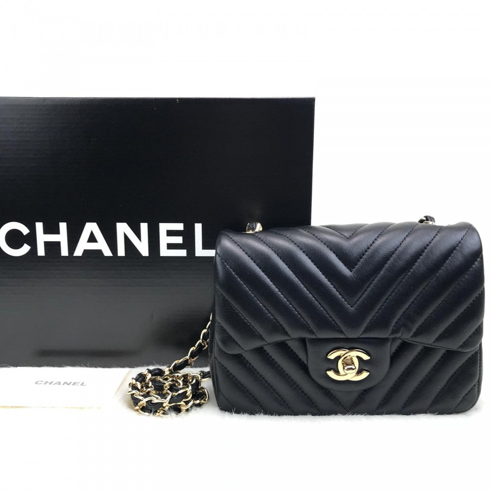 chanel-mini-chevron-bag-1-55-black-gold3