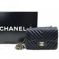 chanel-mini-chevron-bag-1-55-black-gold3