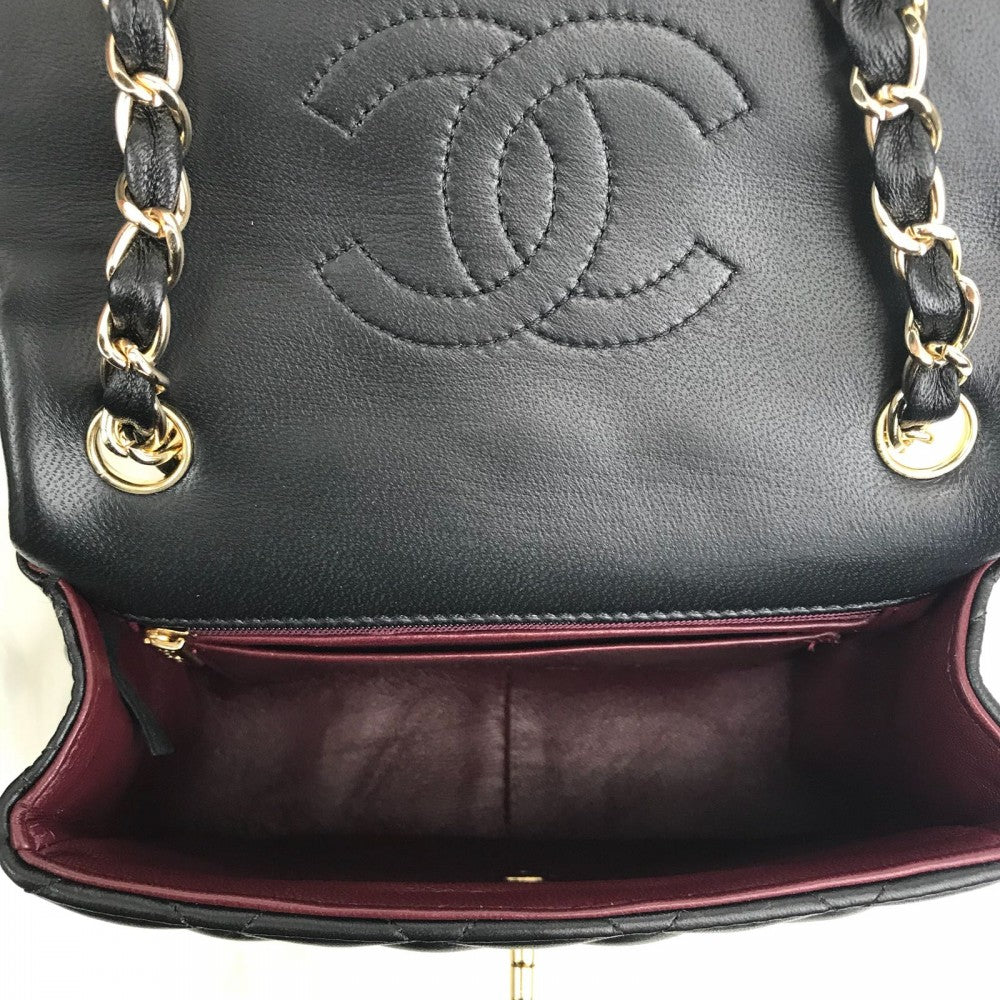 chanel-mini-flap-bag-1-55-blakc-gold