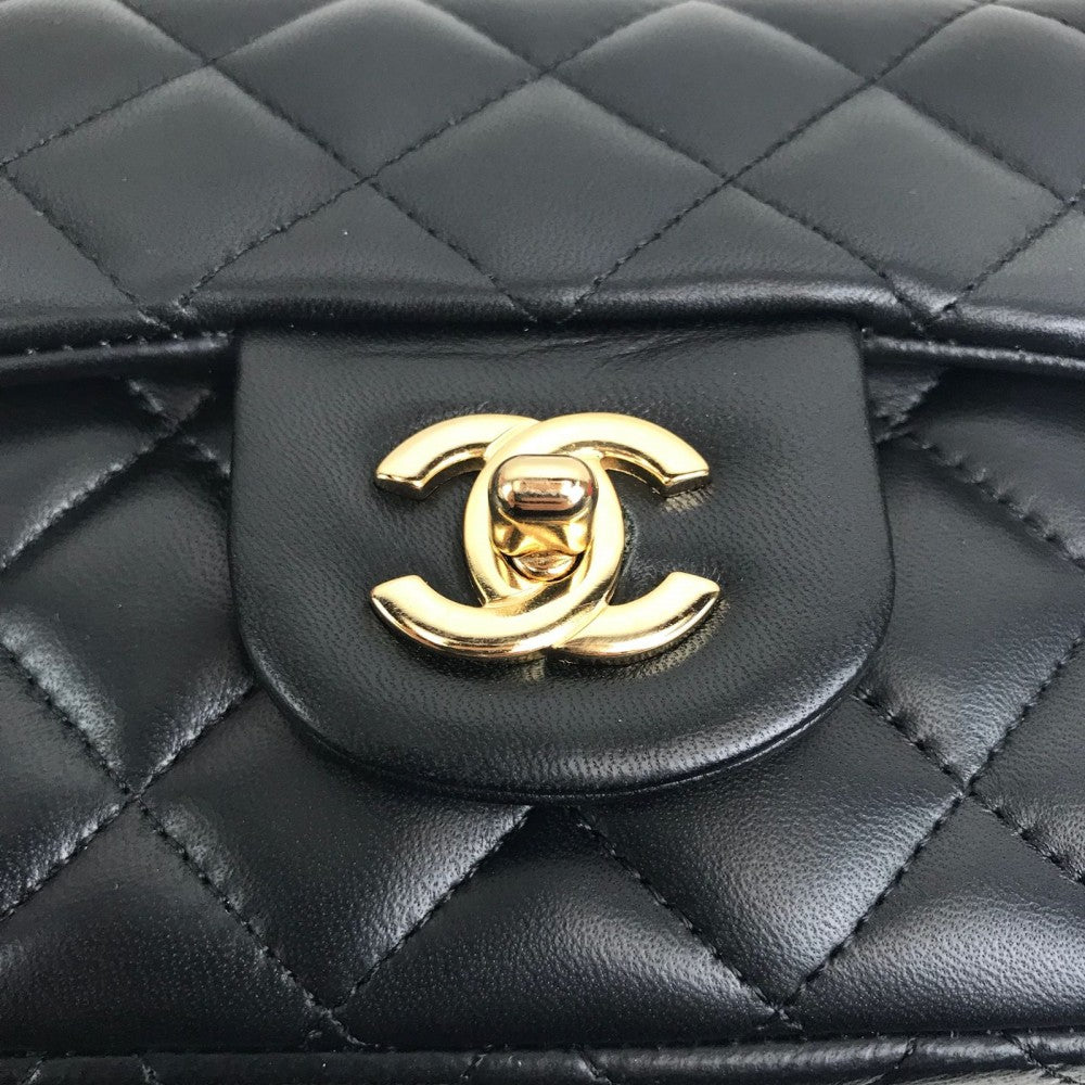 chanel-mini-flap-bag-1-55-blakc-gold3