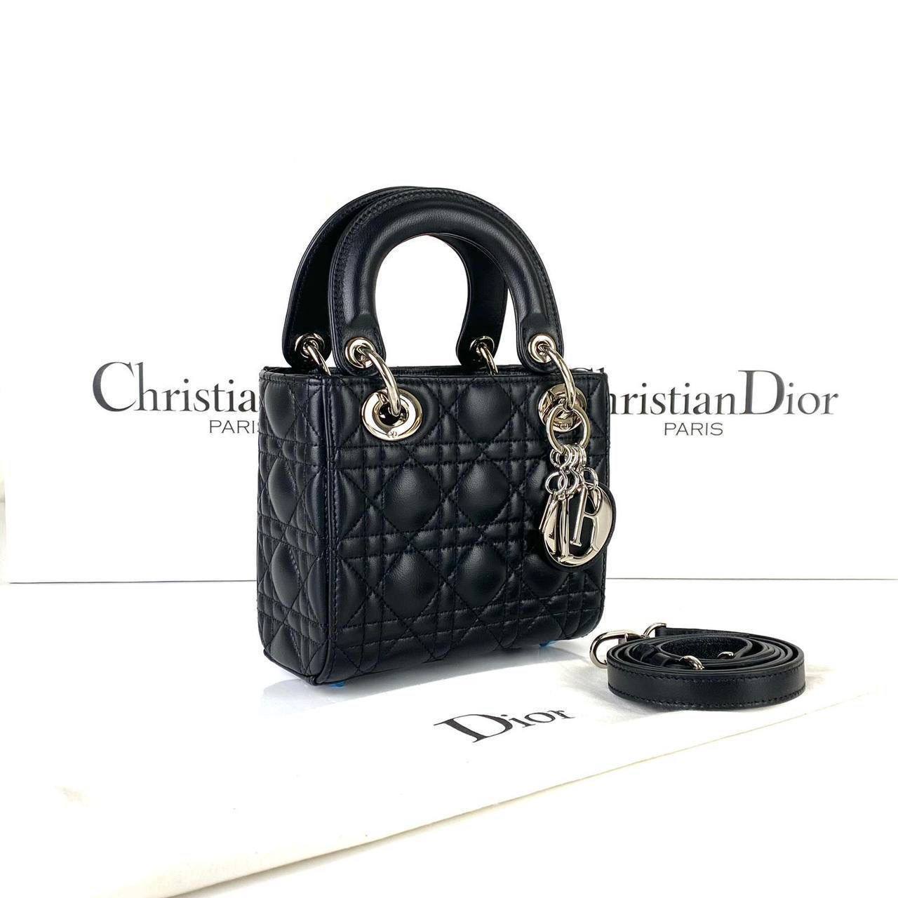 Christian Dior Mini Lady Dior Bag infront of brand
