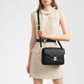 LV_Pochette_Metis_Monogram_Empreinte_Leather_Black_Ambiance view