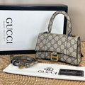 balenciaga_gucci_hourglass_mini_handbag_embossed_front