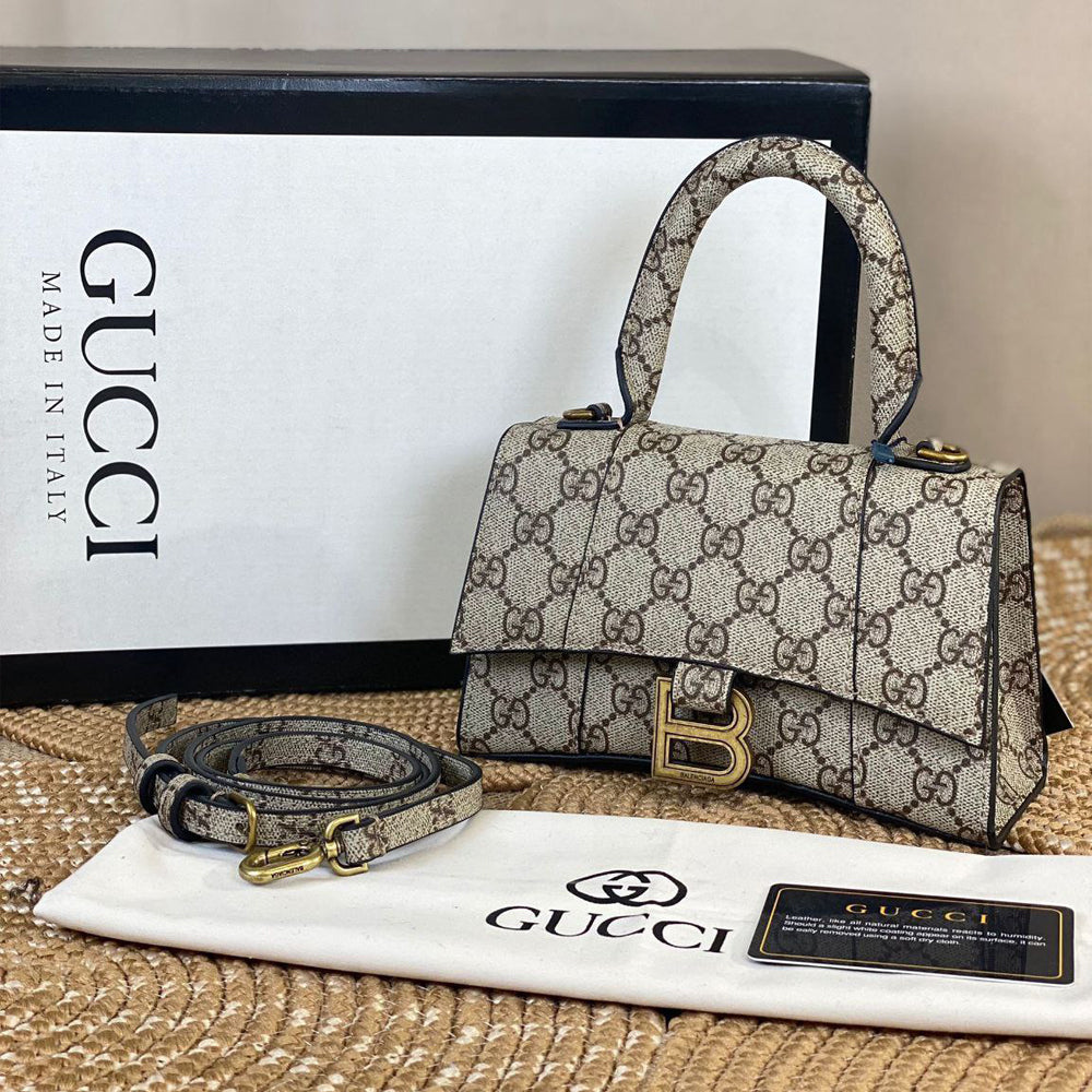 balenciaga_gucci_hourglass_mini_handbag_embossed_front
