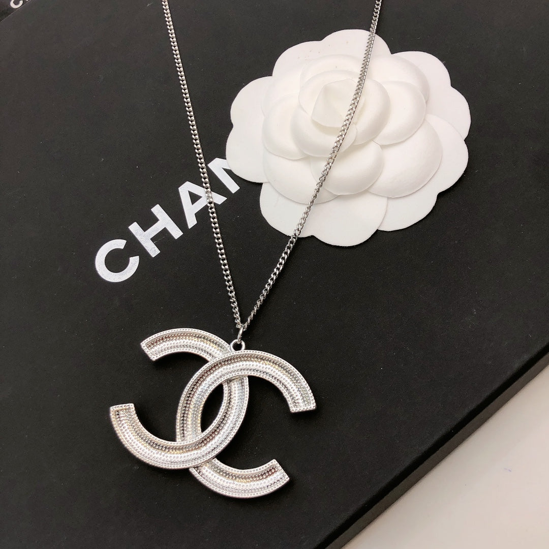 Elegant CC Pendant Necklace with Rhinestones in Silver