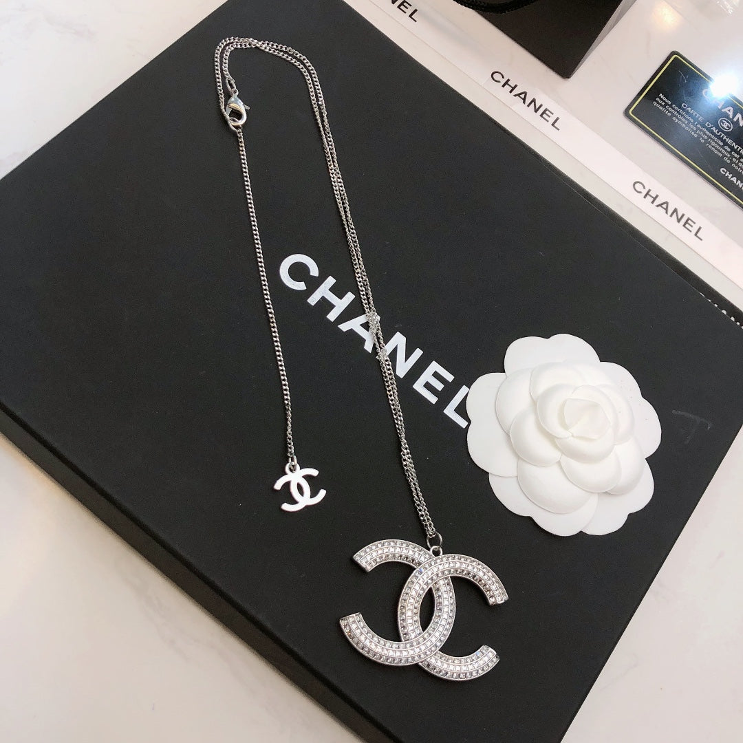 Elegant CC Pendant Necklace with Rhinestones in Silver